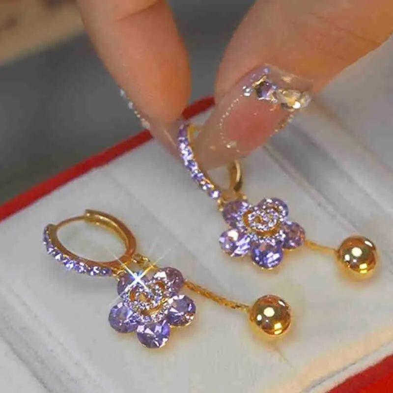 🔥【Cumpărați 1, primiți 1 gratuit】2026 Lumina avansată Diamante de lux Floral Delicate Tassel Cercei