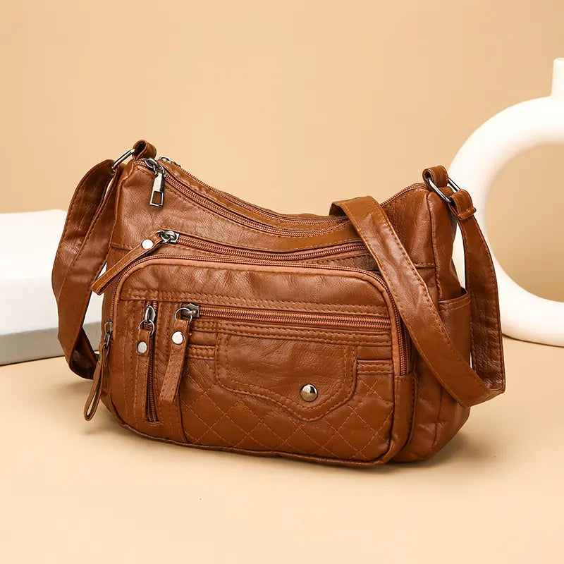 💥👜【Cumpără 1 primești 1 gratis】👜2024 noua geantă de umăr/geantă crossbody din piele moale de mare capacitate