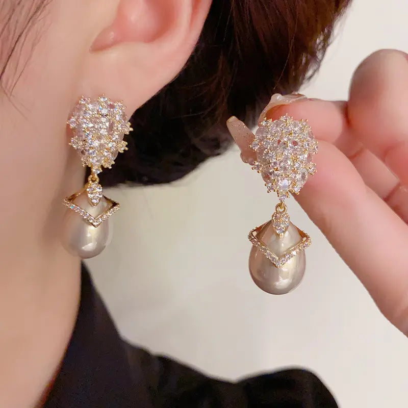💞【Cumpărați 1, primiți 1 gratuit】S925 Silver Pearl Full Diamond Light Luxury Cercei
